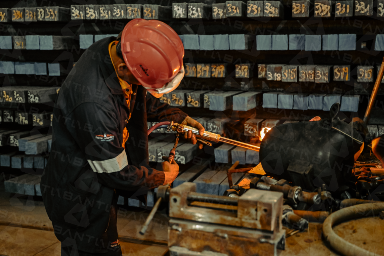 Interior workspace and heavy machinery at the Abantu Africa steel remelting plant