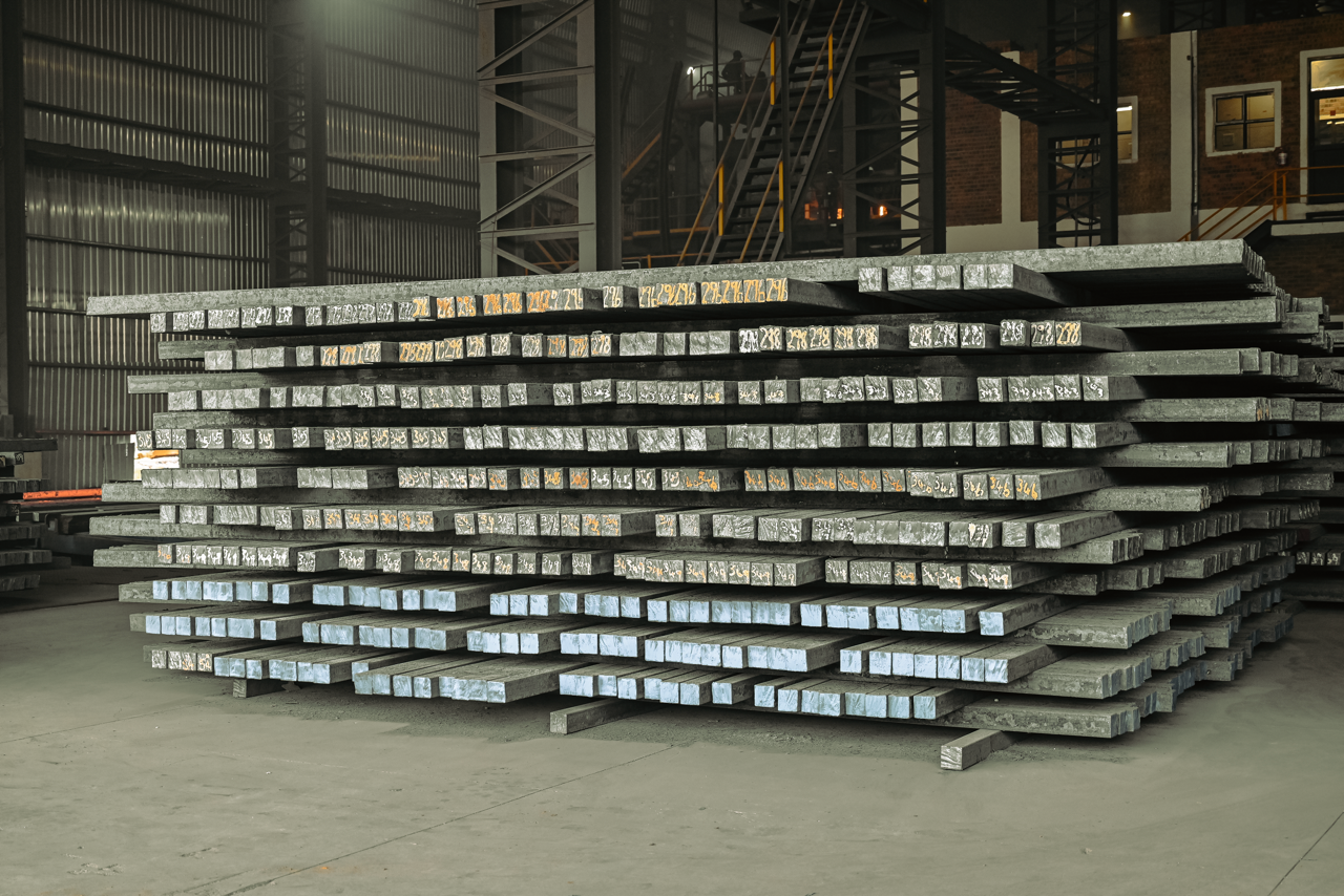 High-quality continuous cast steel billets stacked for structural and industrial applications